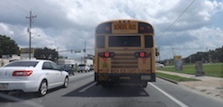 School bus travels south on US 1 In New Smyrna Beach / Headline Surfer